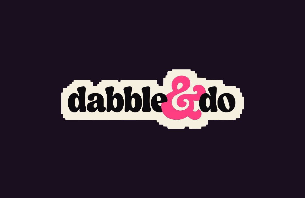 Dabble & Do wordmark on plum business-card artwork